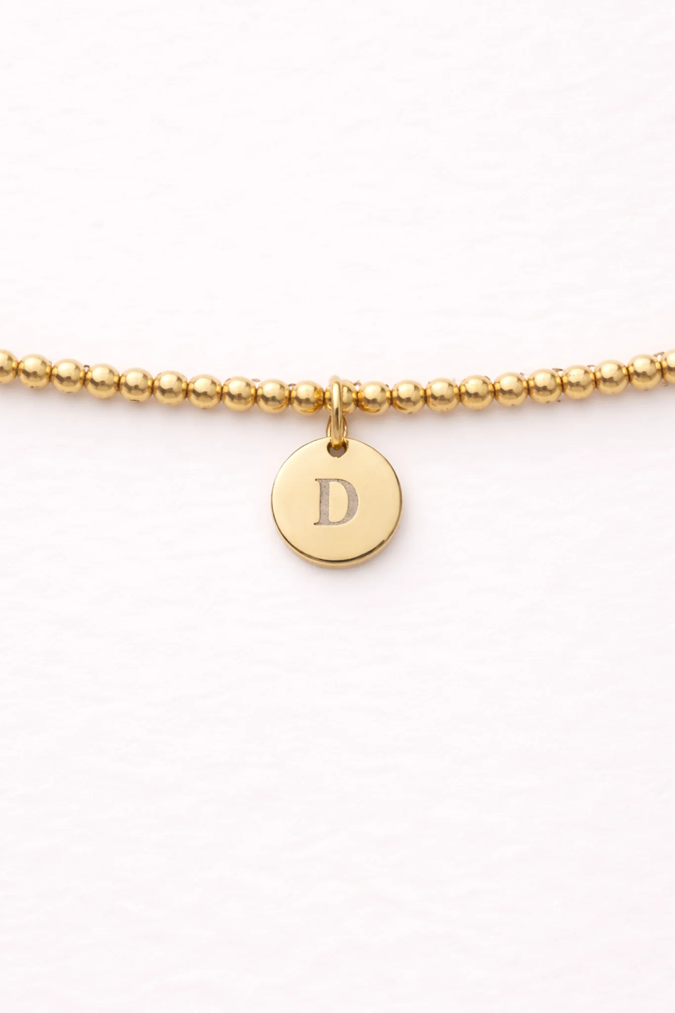 Engraved Circle Charm Beaded Bracelet
